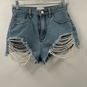 Abrand Jeans High relaxed distressed jean shorts